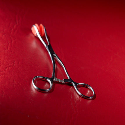 Forceps by KINK closed with ratchet lock engaged